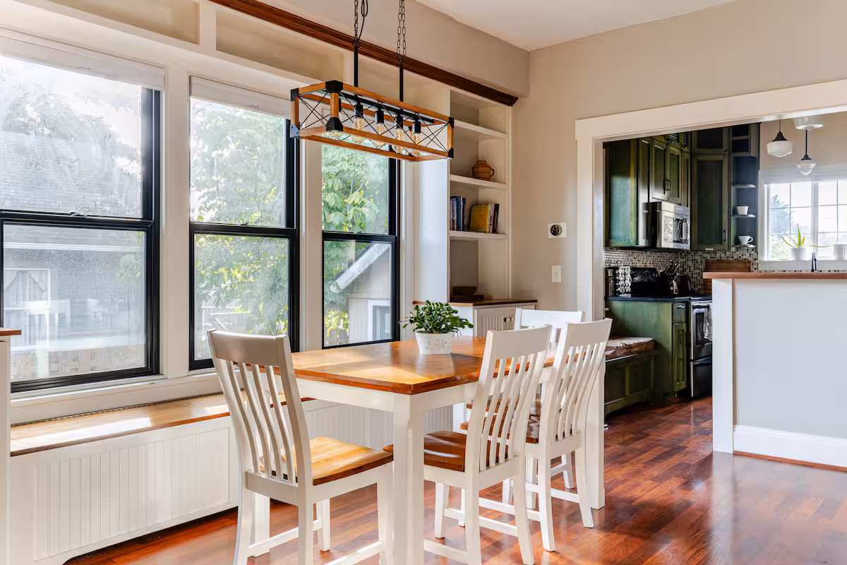 Dining room with large windows in The Seattle Craftsman