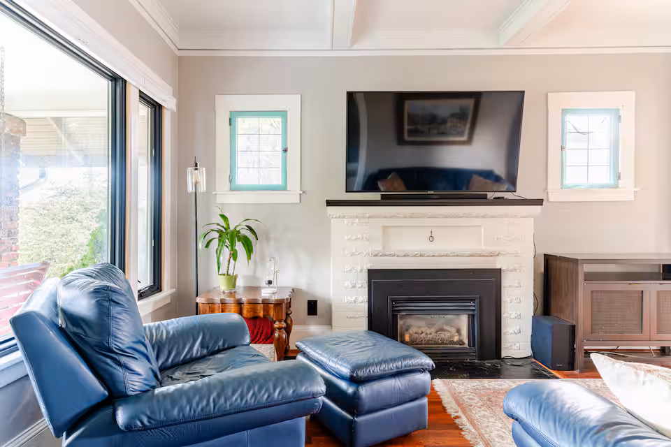 Living room with couches and TV in the Green Lake monthly rental